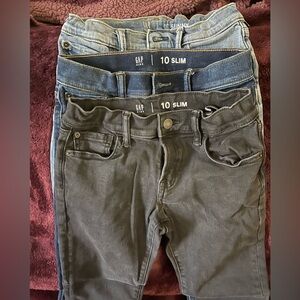 Three pairs of GAP Boys Slim Jeans - Black and Blue